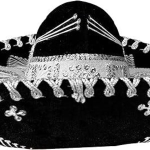 May include: A black sombrero with silver embroidery and trim. The hat features a wide brim and a tall, rounded crown. The decorative silver trim outlines the brim and crown, with additional embroidered floral and geometric designs.
