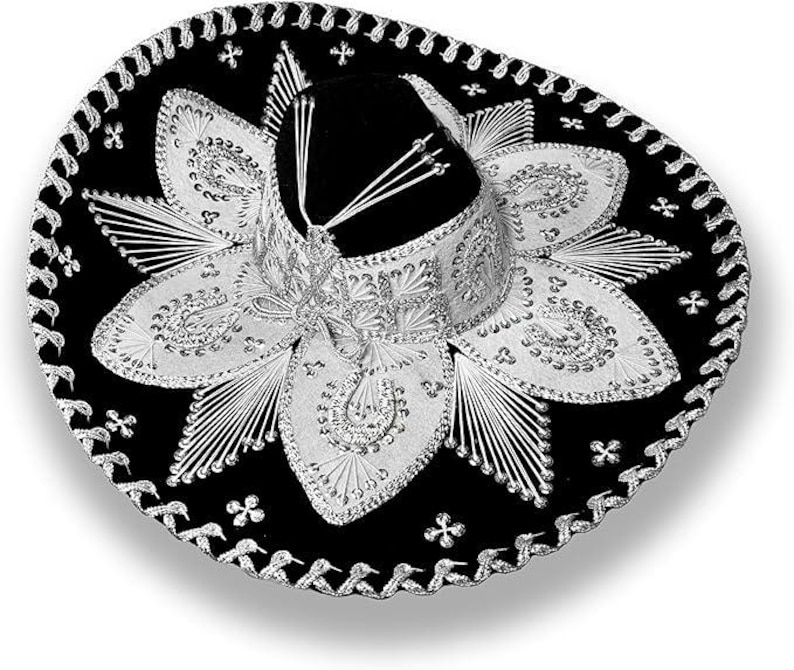 May include: A black sombrero with intricate silver embroidery and trim. The hat features a wide brim and a tall, rounded crown. The silver detailing includes floral and geometric patterns, creating a festive and decorative look.