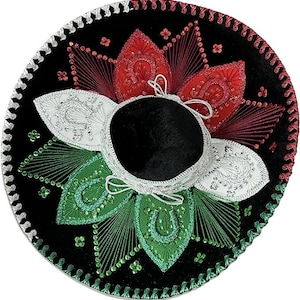 May include: A black sombrero with red, white, and green floral embroidery. The hat features a black velvet crown and a wide, decorated brim with silver trim. The design includes sequins and intricate stitching, creating a festive look.