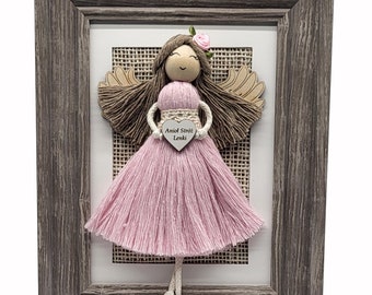 Macrame angel in a frame, handicraft