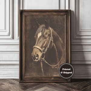 May include: Sepia-toned framed print of a horse's head, featuring a detailed bridle and a white blaze on its face. The artwork is set against a dark background, with the text "Printed & Shipped" on a circular label.