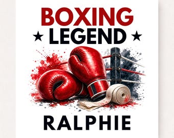 May include: A graphic illustration featuring the text BOXING LEGEND and RALPHIE in bold lettering. Two red boxing gloves rest near a rolled beige hand wrap and a boxing ring corner post, accented by red and black watercolor paint splatters.