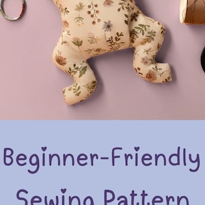 May include: A variety of plush frog toys in different fabrics and patterns. One is held by a hand. The image includes text that says "Pocket-Sized Anxiety Plushie" and "Beginner-Friendly Sewing Pattern".