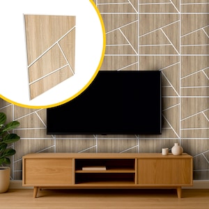 May include: A light wood-effect wall panel with white geometric detailing. The panel is shown against a wall with a matching design, a black television, and a wooden media unit.