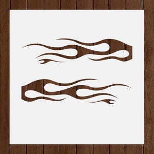 May include: Two brown flame designs on a white background. The flames have a wood grain texture and are horizontally oriented. The image is set against a dark brown wooden background.