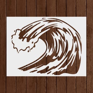 May include: A brown and white stencil featuring a stylized wave design. The wave is depicted with flowing lines and a cresting top, creating a dynamic and artistic representation of ocean waves. The stencil is suitable for various craft projects.