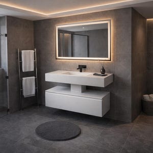 May include: Modern bathroom with gray tile walls and flooring. Features a white floating vanity with a black faucet, a large illuminated mirror, and a towel rack. A round gray rug sits on the floor.