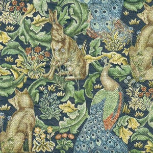 May include: A patterned paper napkin with a detailed illustration of a peacock, rabbits, and foxes amidst green foliage and flowers. The design has a dark blue background with a vintage aesthetic.