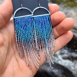 shades of blue and iridescent Delica beads on rhodium semi-circle