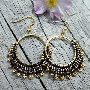 black and gold Delica beaded earrings on 24k gold plated hoops