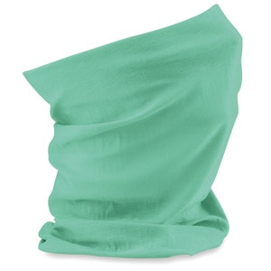 May include: A light green neck gaiter made of soft fabric. The gaiter is folded and ready to be worn.