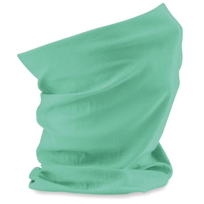 May include: A light green neck gaiter made of soft fabric. The gaiter is folded and ready to be worn.