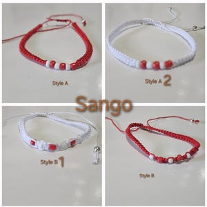May include: Four red and white friendship bracelets with beads. The bracelets are in two styles, one with a single strand and one with a double strand. The bracelets are labelled "Style A" and "Style B".