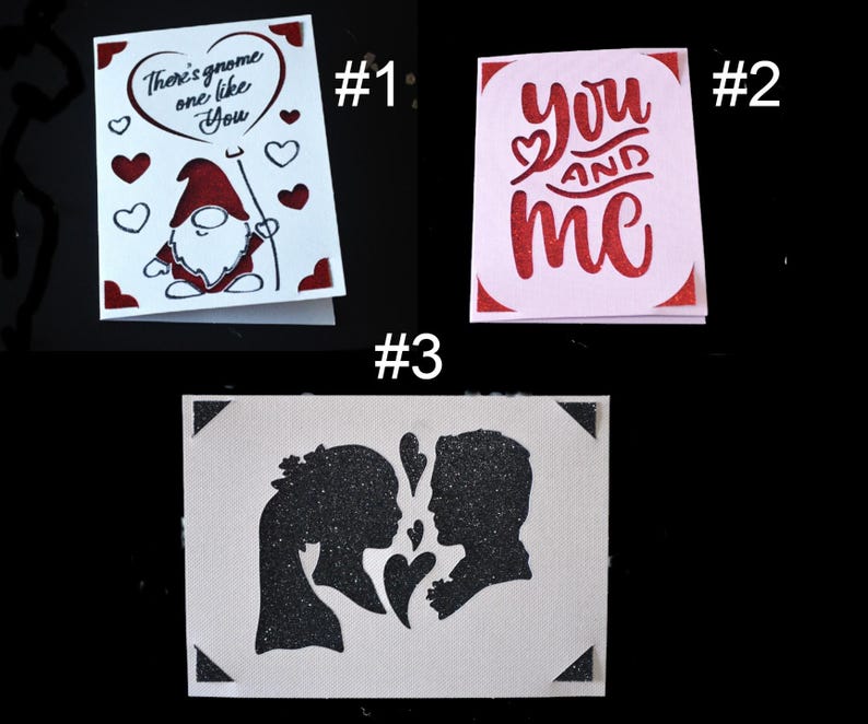 May include: Three Valentine's Day cards with different designs. The first card features a red gnome with a heart balloon that says "There's gnome one like you". The second card is pink and says "you and me" in red. The third card features a black silhouette of a couple with hearts.