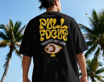 Pull Focus T-shirt | Photographer Videographer Gift | Retro Eye Graphic, Creativity Isnt Dead | Film Production