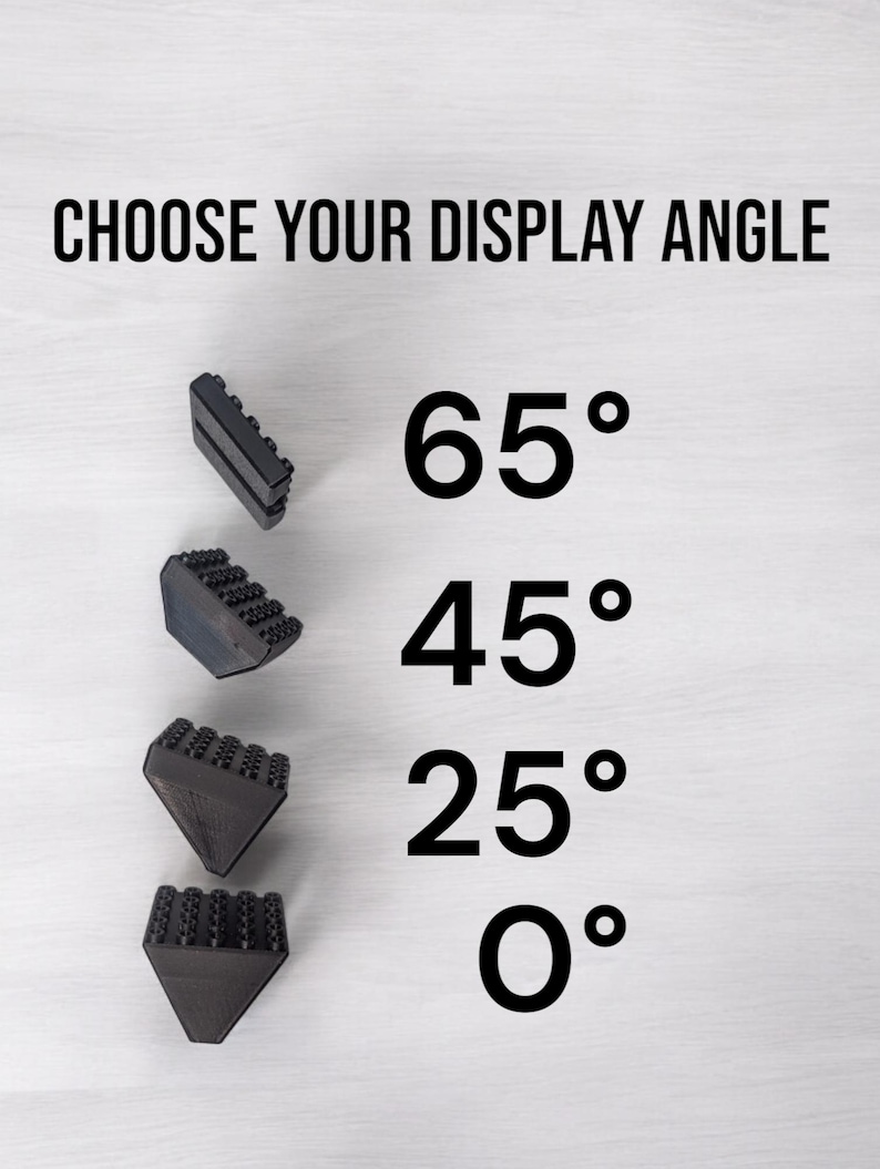 May include: Black display stands in various shapes, showcasing different angles: 65&deg;, 45&deg;, 25&deg;, and 0&deg;. The text "CHOOSE YOUR DISPLAY ANGLE" is at the top. The stands are designed to hold items at specific angles.