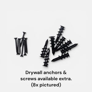 May include: Black drywall screws and anchors are displayed against a white background. The image shows a collection of screws and anchors, with the text "Drywall anchors & screws available extra. (8x pictured)" below.