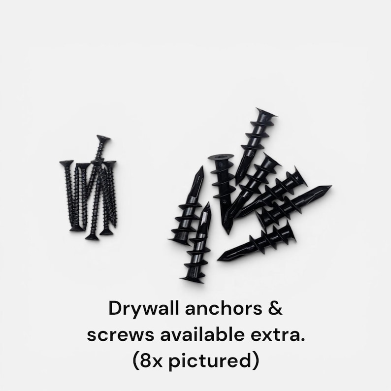 May include: Black drywall screws and anchors are displayed against a white background. The image shows a collection of screws and anchors, with the text "Drywall anchors & screws available extra. (8x pictured)" below.