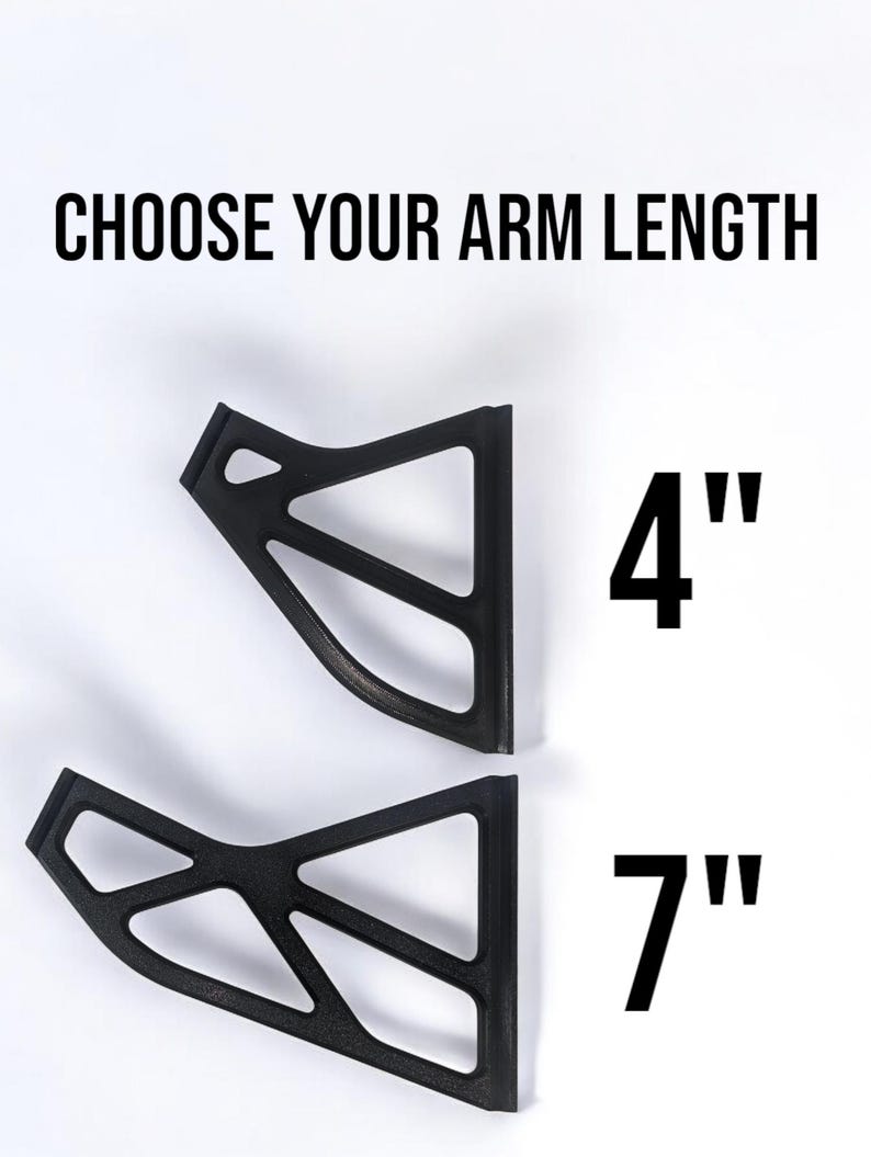 May include: Two black, geometric-shaped brackets with open designs are displayed against a white background. The text "CHOOSE YOUR ARM LENGTH" is above the brackets. One bracket is labeled "4" and the other is labeled "7".