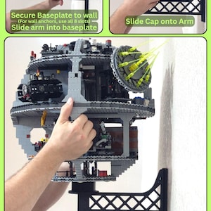 May include: A black 3D-printed wall-mounted bracket system for a large spherical building block model. The set includes a baseplate, a lattice-patterned support arm, and a rotating cap. Text instructions include Secure Baseplate to wall, Slide arm into baseplate, Slide Cap onto Arm, and Slide model onto rotating cap.