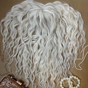 May include: A long, wavy hair topper in a bright platinum blonde shade. The hairpiece features a center part and voluminous, loose curls that cascade downward. It is accompanied by a small, glittery gold clutch and strands of white pearls.