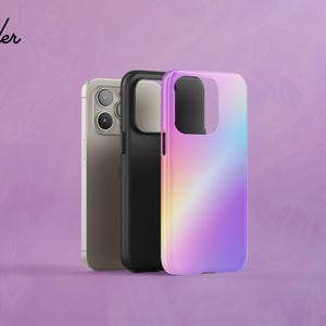 three different phone cases, each with a unique color and design, against a purple background.
