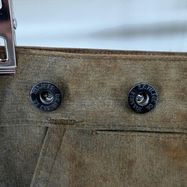 Pantalones de caza dobles Filson, lona de algodón encerado, color verde oliva/marrón claro, para hombre, fabricados en EE. UU., talla 36x31. imagen 3