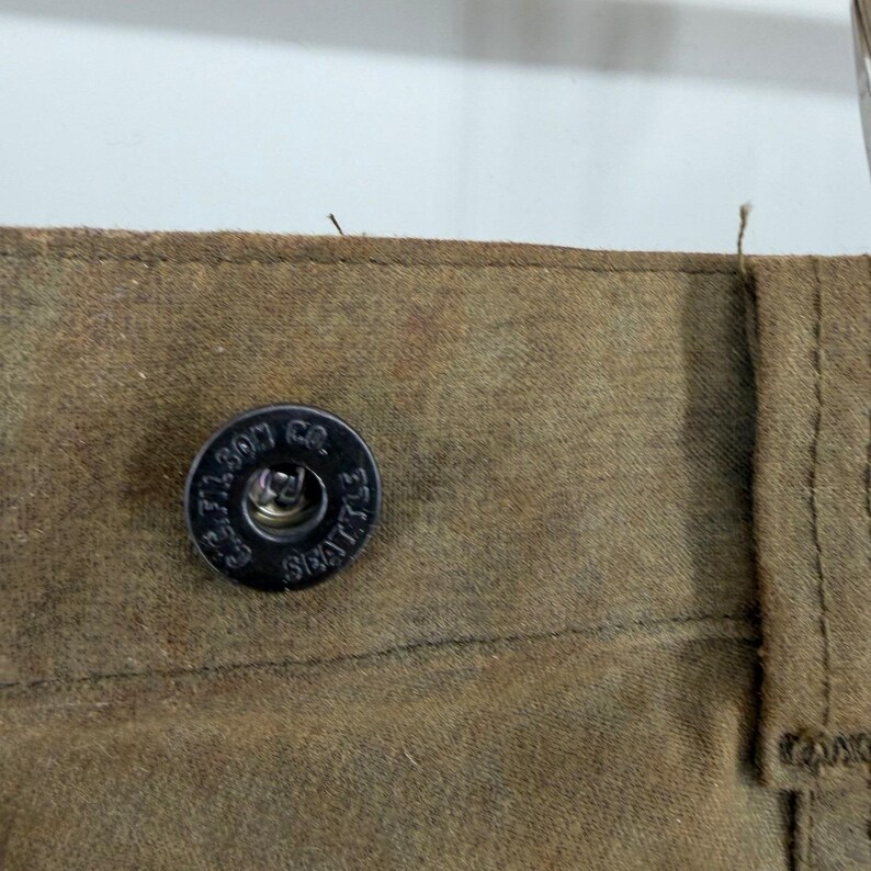 Pantalones de caza dobles Filson, lona de algodón encerado, color verde oliva/marrón claro, para hombre, fabricados en EE. UU., talla 36x31. imagen 9