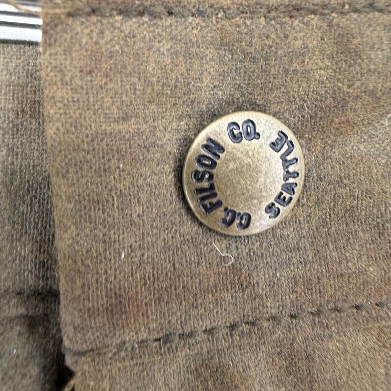 Pantalones de caza dobles Filson, lona de algodón encerado, color verde oliva/marrón claro, para hombre, fabricados en EE. UU., talla 36x31. imagen 2