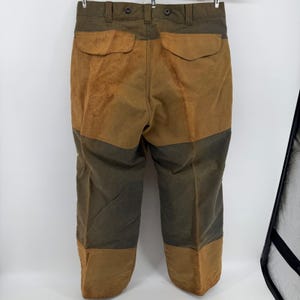 Pantalones de caza dobles Filson, lona de algodón encerado, color verde oliva/marrón claro, para hombre, fabricados en EE. UU., talla 36x31. imagen 5