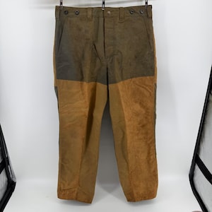 Pantalones de caza dobles Filson, lona de algodón encerado, color verde oliva/marrón claro, para hombre, fabricados en EE. UU., talla 36x31. imagen 1