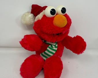 Gorro de Papá Noel y bufanda de peluche de Elmo de Barrio Sésamo de Tyco, año 1997 (70081)