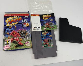 Juego Smash TV para Nintendo NES, versión arcade de Acclaim de 1991, completo con caja y manual.