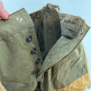 Pantalones de caza dobles Filson, lona de algodón encerado, color verde oliva/marrón claro, para hombre, fabricados en EE. UU., talla 36x31. imagen 13