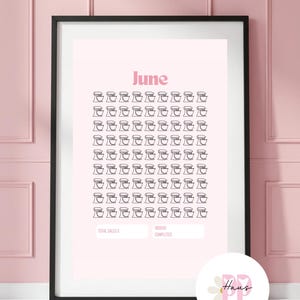 May include: A framed pink print with the word "June" at the top and rows of mixer illustrations. Below, there are blank spaces for "Total Sales" and "Orders Completed." A circular logo with the text "PP Haus" is in the bottom right corner.