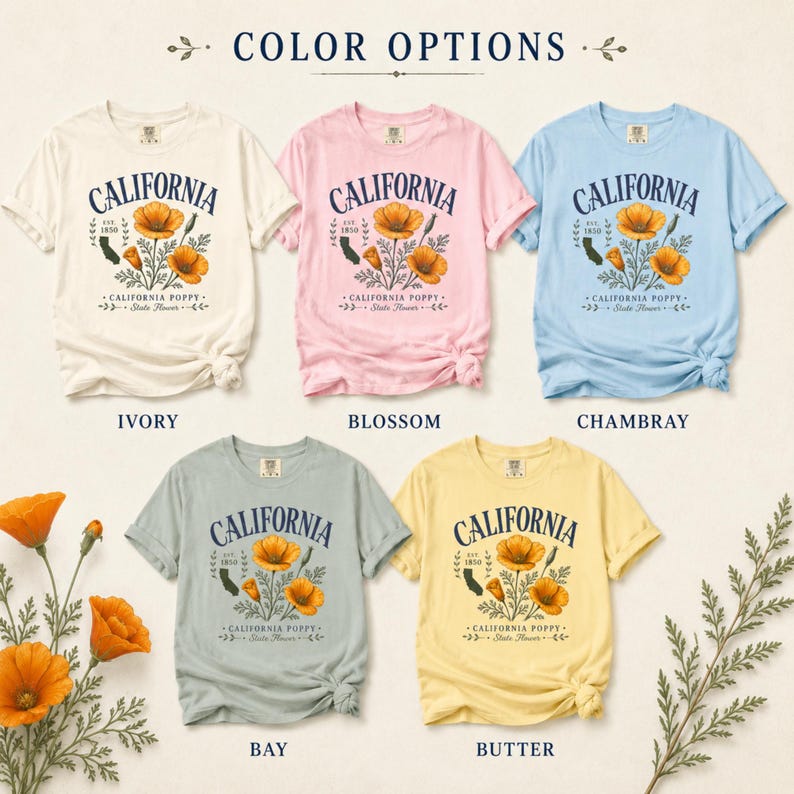 Puede incluir: Una colecci&oacute;n de cinco camisetas de manga corta en colores marfil, rosa, celeste, gris y amarillo. Cada camiseta presenta "CALIFORNIA" sobre un gr&aacute;fico de amapolas de California y el texto "CALIFORNIA POPPY - State Flower."