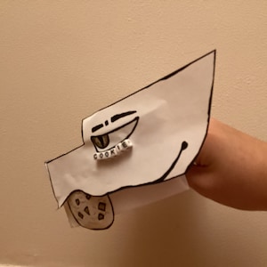 Marioneta de dragón de papel de galleta