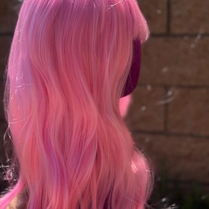 Pastel Pink Cosplay Wig with Bangs – 26” Synthetic, Middle Part, Adjustable Cap