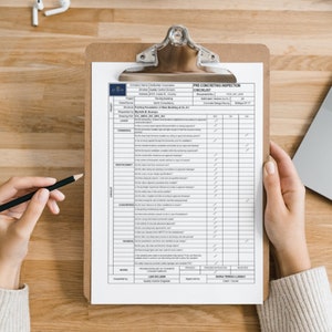 May include: A pre-concrete inspection checklist form on a clipboard. The form includes sections for labor, reinforcement, concrete, and general items. The form is filled out with check marks and notes.