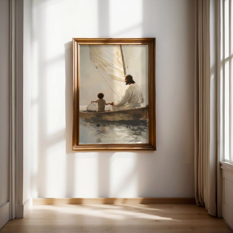 May include: A framed painting shows a figure in white robes with a child in a sailboat. The artwork has a warm colour palette, focusing on the figures and the boat. The painting is displayed on a white wall in a room with wooden flooring.