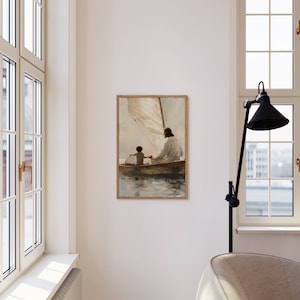 May include: A framed art print showing two figures in a sailboat on water. The artwork uses soft, muted colours and has a vintage aesthetic. The figures are dressed in flowing robes, and the boat has a sail.
