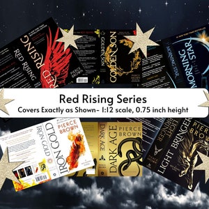 May include: Covers for the Red Rising series of science fiction novels by Pierce Brown. The covers feature a red bird, a golden wreath, a crescent moon, a red feather, a snake, and a horse. The covers are arranged in a collage with a white background and gold stars.