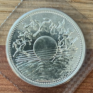 Japan Silver 10000 Yen Coin the 60th Emporer on the Throne
