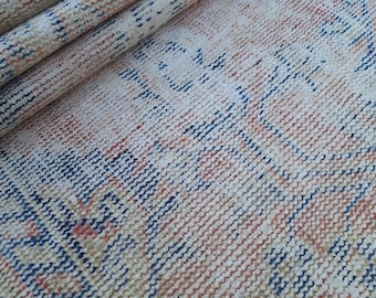 Vintage Turkish Wool Rug: 5.6x8.9 ft, Pale Red and Blue