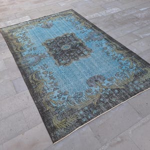 Vintage Turkish Area Rug: 6x9 Light Blue & Brown Woven Wool Rug