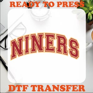 May include: Red and gold "NINERS" text on a white background. DTF transfer ready to press.