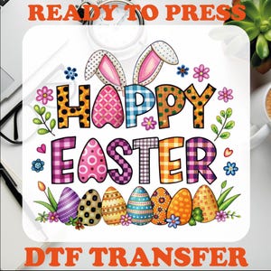 May include: A colorful "Happy Easter" design with bunny ears and Easter eggs. The design is ready to be pressed onto a t-shirt or other fabric using a heat press.