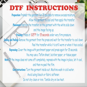 May include: White paper with red text reading "DTF INSTRUCTIONS". Instructions include preheating, placement, pressing at 325&deg;F for 15 seconds, cooling, peeling, and care instructions. A laptop, glasses, and a pen are also visible.