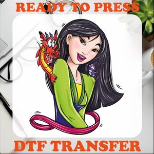 May include: A DTF transfer design featuring a cartoon illustration of Mulan, a Disney princess, with a red dragon and a purple bug on her shoulder. The design is ready to press.