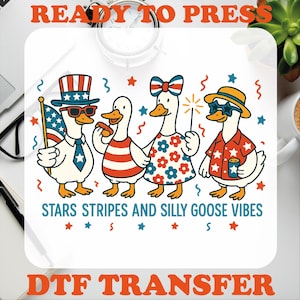 May include: A DTF transfer design featuring four cartoon geese dressed in patriotic attire. One goose holds an American flag, while others wear sunglasses, hats, and festive clothing. The text reads "READY TO PRESS" and "STARS STRIPES AND SILLY GOOSE VIBES."